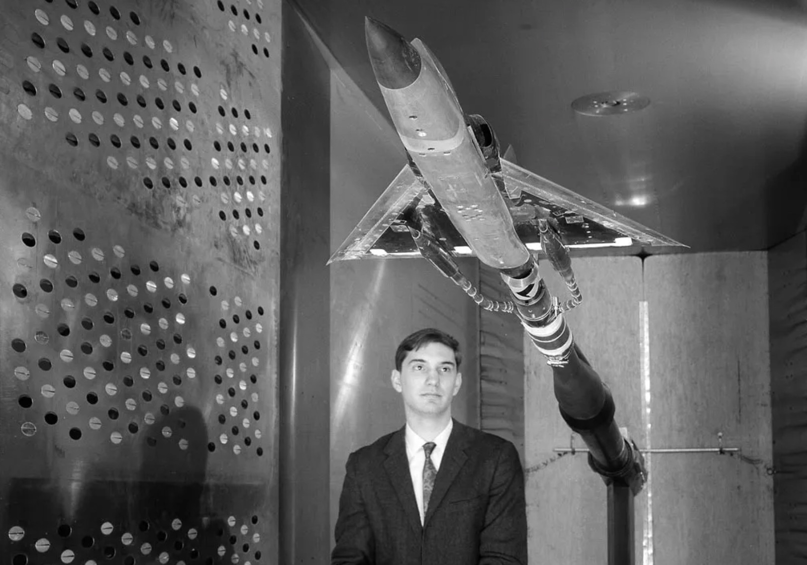 A researcher checks a 22-percent scale model of a Convair F‒106 Delta Dart 